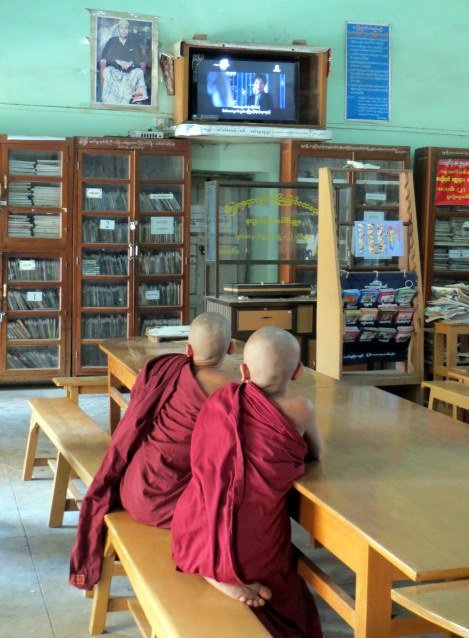 Monks Watching a Movie - InsideBurma Tours