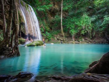 Turquoise waters underneath Erawan waterfall